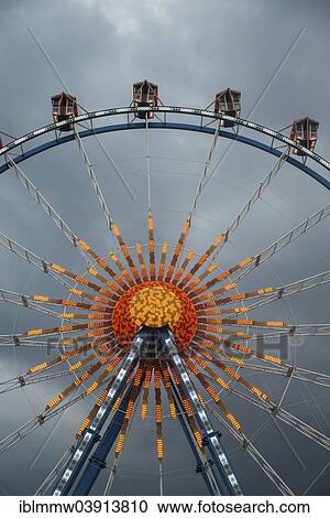 "Ferris wheel against dark clouds, Munich Spring Festival, Theresienwiese, Munich, Bavaria, Germany, Europe" View Large Photo Image Stock Image - "Ferris wheel against dark clouds, Munich Spring Festival, Theresienwiese, Munich, Bavaria, Germany, Europe". Fotosearch