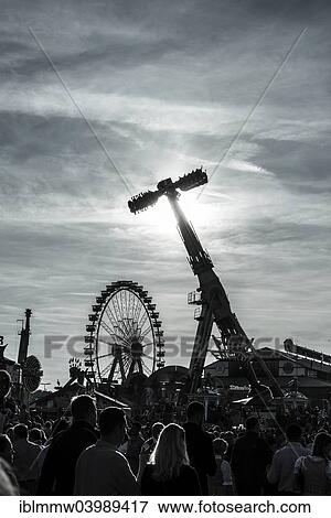 "Ferris wheel and fun rides in back light, Oktoberfest, Munich, Upper Bavaria, Bavaria, Germany, Europe" View Large Photo Image Stock Photo - "Ferris wheel and fun rides in back light, Oktoberfest, Munich, Upper Bavaria, Bavaria, Germany, Europe". Fotosearch