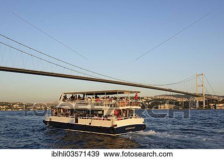 "Ferry across the Bosphorus, Bosphorus Bridge, Asian shore, seen from Ortakoey, Ueskuedar, Istanbul, asian and european side, Istanbul Province, Turkey, Asia" View Large Photo Image Stock Photo - "Ferry across the Bosphorus, Bosphorus Bridge, Asian shore, seen from Ortakoey, Ueskuedar, Istanbul, asian and european side, Istanbul Province, Turkey, Asia". Fotosearch