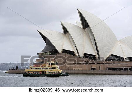 Stock Photograph - "Ferry and Sydney Opera House on Bennelong Point, Sydney Harbour, Sydney, New South Wales, NSW, Australia, Oceania". Fotosearch