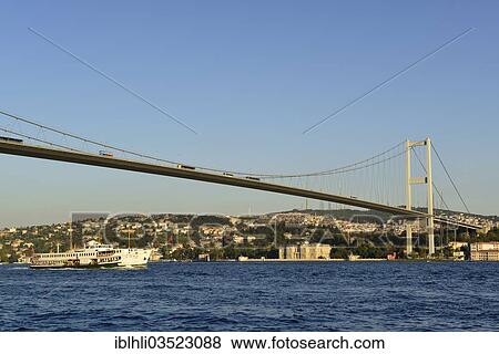 "Ferry on the Bosphorus, Bosphorus Bridge, Beylerbeyi Palace on the Asian shore, seen from Ortakoey, Uskudar, Istanbul, asian and european side, Turkey, Asia" View Large Photo Image Stock Photo - "Ferry on the Bosphorus, Bosphorus Bridge, Beylerbeyi Palace on the Asian shore, seen from Ortakoey, Uskudar, Istanbul, asian and european side, Turkey, Asia". Fotosearch