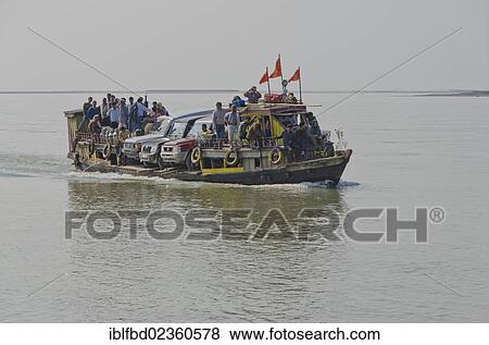 "Ferryboat overloaded with 3 jeeps and many people, crossing Brahmaputra River, Ghat, India, Asia" View Large Photo Image Stock Photo - "Ferryboat overloaded with 3 jeeps and many people, crossing Brahmaputra River, Ghat, India, Asia". Fotosearch