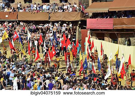 "Festive parade before the historic horse race Palio di Siena, Piazza del Campo, Siena, Tuscany, Italy, Europe" View Large Photo Image Stock Photo - "Festive parade before the historic horse race Palio di Siena, Piazza del Campo, Siena, Tuscany, Italy, Europe". Fotosearch