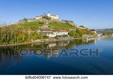 Stock Photo - "Festung Marienberg castle located on a hill above the town, seen across the river Main, in autumn, Wurzburg, Bavaria, Germany, Europe". Fotosearch