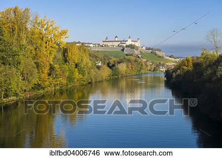 Stock Photograph - "Festung Marienberg castle located on a hill above the town, seen across the river Main, in autumn, Wurzburg, Bavaria, Germany, Europe". Fotosearch
