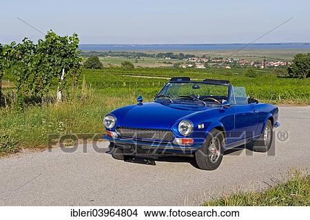Picture - "Fiat Spider 124 vintage car, USA version, built in 1970". Fotosearch