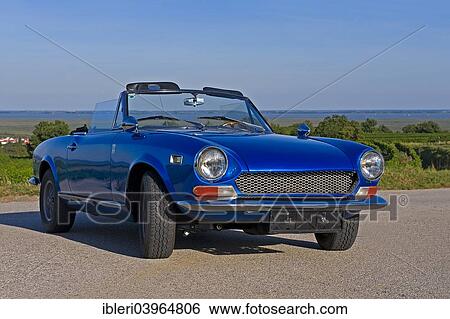 "Fiat Spider 124 vintage car, USA version, built in 1970" View Large Photo Image Stock Photograph - "Fiat Spider 124 vintage car, USA version, built in 1970". Fotosearch