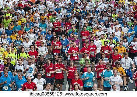 Stock Photograph - "Field of runners at the J. P. Morgan Corporate Challenge Run, Westend, Frankfurt am Main, Hesse, Germany, Europe". Fotosearch