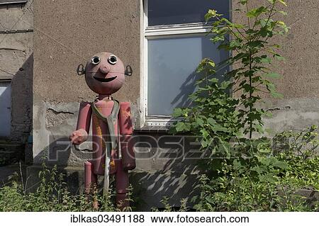 "Figure, assembled from fire extinguishers in an abandoned backyard, Innenhafen, Duisburg, Ruhr district, North Rhine-Westphalia, Germany, Europe" View Large Photo Image Stock Photo - "Figure, assembled from fire extinguishers in an abandoned backyard, Innenhafen, Duisburg, Ruhr district, North Rhine-Westphalia, Germany, Europe". Fotosearch