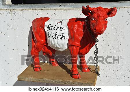 Stock Photograph - "Figure of a dairy cow pleading for fair milk prices, Salzburg Lake District, Salzburg State, Austria, Europe". Fotosearch