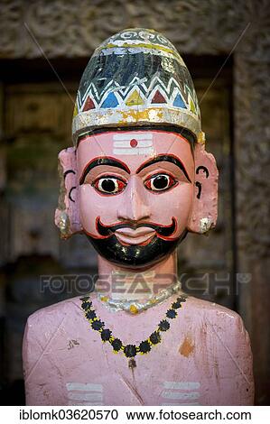 Stock Image - "Figure of a Shiva follower, wooden sculpture, Kochi, Kerala, India, Asia". Fotosearch