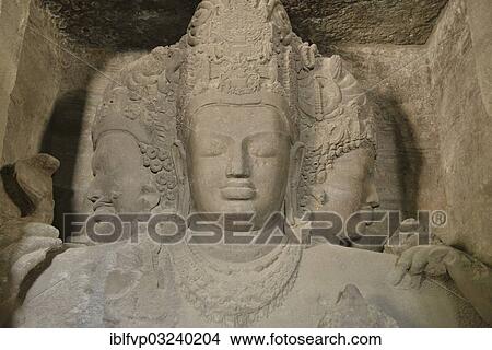 "Figure of a three-headed Shiva in the main cave of the Shiva temple on Elephanta Island, UNESCO World Heritage Site, Mumbai, Maharashtra, India, Asia" View Large Photo Image Picture - "Figure of a three-headed Shiva in the main cave of the Shiva temple on Elephanta Island, UNESCO World Heritage Site, Mumbai, Maharashtra, India, Asia". Fotosearch
