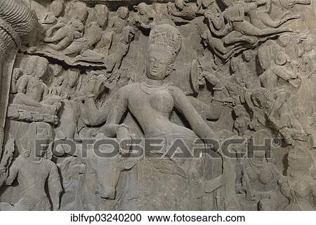 Stock Image - "Figure of Shiva in one person with Parvati in the main cave of the Shiva temple on Elephanta Island, UNESCO World Heritage Site, Mumbai, Maharashtra, India, Asia". Fotosearch