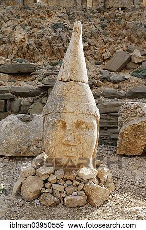 Stock Photo - "Figure of the god Apollo Mithras, East Terrace, Mount Nemrut, Nemrut Dagi, Adiyaman Province, Southeastern Anatolia Region, Anatolia, Turkey, Asia". Fotosearch