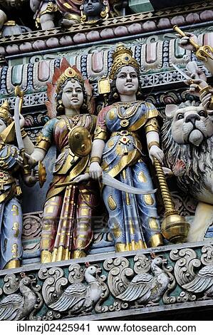 "Figures at the entrance of a Hindu temple, Veerama Kaliamman Temple, Serangoon Street, in the Indian district, Little India, city centre, Singapore, Asia" View Large Photo Image Stock Image - "Figures at the entrance of a Hindu temple, Veerama Kaliamman Temple, Serangoon Street, in the Indian district, Little India, city centre, Singapore, Asia". Fotosearch