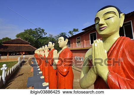 "Figures of Buddhist monks in front of a monastery, near Sigiriya, Central Province, Sri Lanka, Asia" View Large Photo Image Stock Photography - "Figures of Buddhist monks in front of a monastery, near Sigiriya, Central Province, Sri Lanka, Asia". Fotosearch