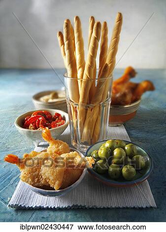 "Finger food, tapas with bread sticks and breaded shrimp" View Large Photo Image Stock Photo - "Finger food, tapas with bread sticks and breaded shrimp". Fotosearch