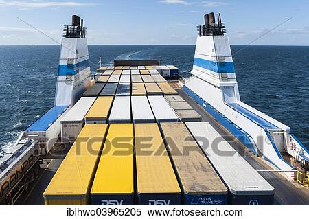 "Finnish ferry on the Baltic Sea, open deck with truck containers, off the island of Gotland, Sweden, Europe" View Large Photo Image Stock Photography - "Finnish ferry on the Baltic Sea, open deck with truck containers, off the island of Gotland, Sweden, Europe". Fotosearch