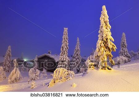 Stock Image - "Finnish log cabin in the snow-covered landscape, Iso Syote, Lapland, Finland, Europe". Fotosearch
