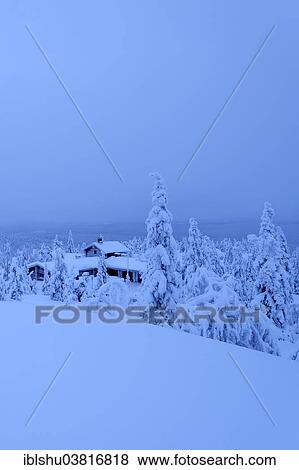 Stock Photo - "Finnish log cabin in the snow-covered landscape, Iso Syote, Lapland, Finland, Europe". Fotosearch