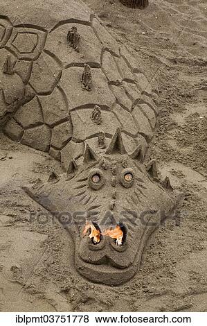 "Fire-breathing dragon, sand sculpture, Torremolinos, Malaga province, Andalusia, Spain, Europe" View Large Photo Image Stock Photo - "Fire-breathing dragon, sand sculpture, Torremolinos, Malaga province, Andalusia, Spain, Europe". Fotosearch