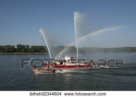 "Fire drill of the Bonn fire brigade, a fire fighting boat with 3 fountains, accompanied by a smaller fire fighting boat, Bonn, North Rhine-Westphalia, Germany, Europe" View Large Photo Image Picture - "Fire drill of the Bonn fire brigade, a fire fighting boat with 3 fountains, accompanied by a smaller fire fighting boat, Bonn, North Rhine-Westphalia, Germany, Europe". Fotosearch