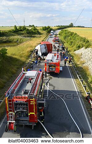 "Fire-fighting operation, fatal traffic accident, frontal collision between an Audi and a truck, airport tangent East, state street ST 2580, in Oberneuching, Erding, Markt Swabia, Bavaria, Germany, Europe" View Large Photo Image Stock Image - "Fire-fighting operation, fatal traffic accident, frontal collision between an Audi and a truck, airport tangent East, state street ST 2580, in Oberneuching, Erding, Markt Swabia, Bavaria, Germany, Europe". Fotosearch