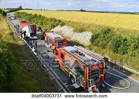 "Fire-fighting operation, fatal traffic accident, frontal collision between an Audi and a truck, airport tangent East, state street ST 2580, in Oberneuching, Erding, Markt Swabia, Bavaria, Germany, Europe" View Large Photo Image Stock Image - "Fire-fighting operation, fatal traffic accident, frontal collision between an Audi and a truck, airport tangent East, state street ST 2580, in Oberneuching, Erding, Markt Swabia, Bavaria, Germany, Europe". Fotosearch