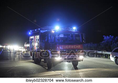 "Fire-fighting vehicle at an accident site on the A8 motorway, Denkendorf, Baden-Wuerttemberg, Germany, Europe" View Large Photo Image Picture - "Fire-fighting vehicle at an accident site on the A8 motorway, Denkendorf, Baden-Wuerttemberg, Germany, Europe". Fotosearch