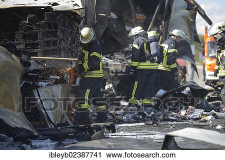 "Firefighters extinguishing a truck fire on the A8 motorway near the """"Echterdinger Ei"""" junction, Stuttgart, Baden-Wuerttemberg, Germany, Europe" View Large Photo Image Stock Image - "Firefighters extinguishing a truck fire on the A8 motorway near the """"Echterdinger Ei"""" junction, Stuttgart, Baden-Wuerttemberg, Germany, Europe". Fotosearch