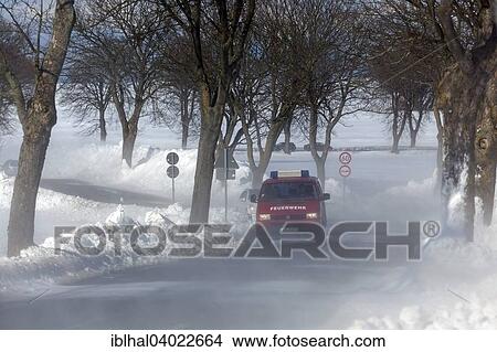 "Firefighters in snow flurry, Kuhlungsborn, Mecklenburg, Germany, Europe" View Large Photo Image Picture - "Firefighters in snow flurry, Kuhlungsborn, Mecklenburg, Germany, Europe". Fotosearch