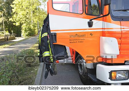 "Firefighter's jacket hanging on a fire engine of the Stuttgart Fire Department, Stuttgart, Baden-Wuerttemberg, Germany, Europe" View Large Photo Image Stock Photo - "Firefighter's jacket hanging on a fire engine of the Stuttgart Fire Department, Stuttgart, Baden-Wuerttemberg, Germany, Europe". Fotosearch
