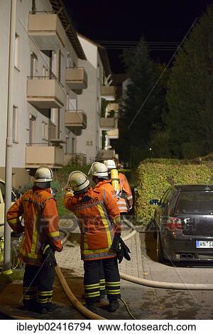 Picture - Firefighters on site at an apartment fire, Stuttgart, Baden-Wuerttemberg, Germany, Europe. Fotosearch