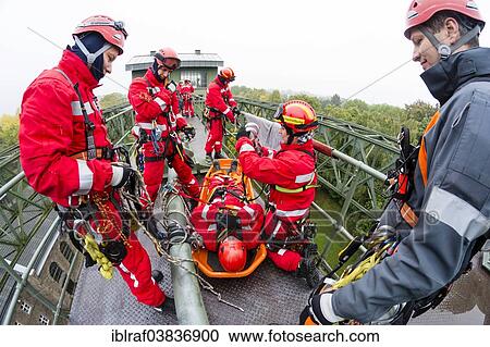 "Firefighters practicing rescue from heights on the old Henrichenburg boat lift, Waltrop, North Rhine-Westphalia, Germany, Europe" View Large Photo Image Stock Image - "Firefighters practicing rescue from heights on the old Henrichenburg boat lift, Waltrop, North Rhine-Westphalia, Germany, Europe". Fotosearch