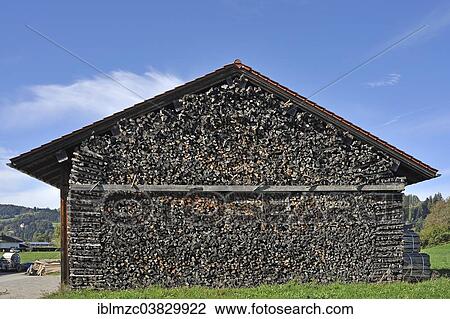 "Firewood, stacked across the entire facade of a barn, Buhl am Alpsee, Oberallgau, Bavaria, Germany, Europe" View Large Photo Image Stock Image - "Firewood, stacked across the entire facade of a barn, Buhl am Alpsee, Oberallgau, Bavaria, Germany, Europe". Fotosearch