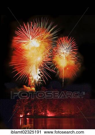"Fireworks at the lake with the symbolic image of a burning forest at front, Schliersee Lake, Bavaria, Germany, Europe" View Large Photo Image Stock Image - "Fireworks at the lake with the symbolic image of a burning forest at front, Schliersee Lake, Bavaria, Germany, Europe". Fotosearch