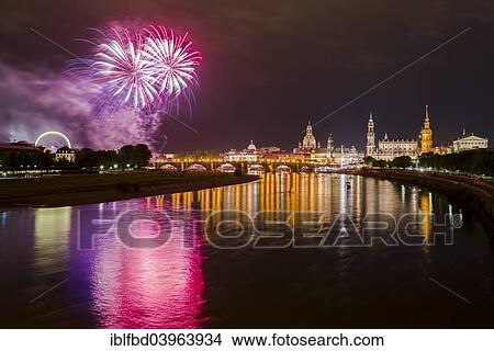 Picture - "Fireworks illuminating the historic part of the town with Frauenkirche church and Bruhl's Terrace, seen from the Marienbrucke bridge, Dresden, Saxonia, Germany, Europe". Fotosearch