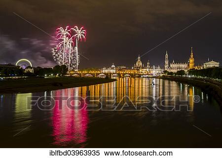 Stock Photography - "Fireworks illuminating the historic part of the town with Frauenkirche church and Bruhl's Terrace, seen from the Marienbrucke bridge, Dresden, Saxonia, Germany, Europe". Fotosearch