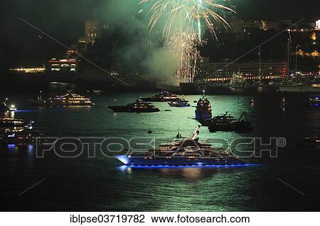 "Fireworks over Monaco at Cap Martin, with the motor yacht """"Ace"""" at the front, Monaco, Monaco, Europe" View Large Photo Image Stock Image - "Fireworks over Monaco at Cap Martin, with the motor yacht """"Ace"""" at the front, Monaco, Monaco, Europe". Fotosearch