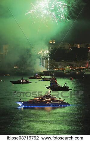 Stock Image - "Fireworks over Monaco at Cap Martin, with the motor yacht """"Ace"""" at the front, Monaco, Monaco, Europe". Fotosearch