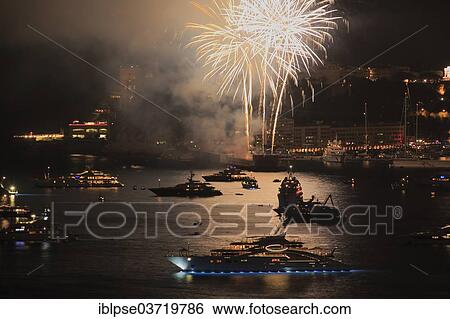 "Fireworks over Monaco at Cap Martin, with the motor yacht """"Ace"""" at the front, Monaco, Monaco, Europe" View Large Photo Image Stock Photograph - "Fireworks over Monaco at Cap Martin, with the motor yacht """"Ace"""" at the front, Monaco, Monaco, Europe". Fotosearch