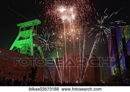 "Fireworks over the disused coal mine of Zeche Ewald Colliery during ExtraSchicht, a night of industrial culture, Herten, Ruhr district, North Rhine-Westphalia, Germany, Europe" View Large Photo Image Stock Photo - "Fireworks over the disused coal mine of Zeche Ewald Colliery during ExtraSchicht, a night of industrial culture, Herten, Ruhr district, North Rhine-Westphalia, Germany, Europe". Fotosearch