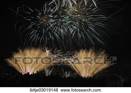 Stock Photo - "Fireworks with many spectators, Pristablich, Laussig, Saxony, Germany, Europe". Fotosearch
