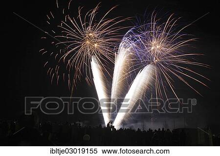 Stock Photography - "Fireworks with many spectators, Pristablich, Laussig, Saxony, Germany, Europe". Fotosearch
