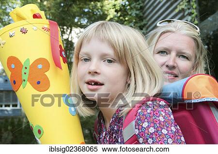 "First day of school, schoolgirl with her mother" View Large Photo Image Stock Photography - "First day of school, schoolgirl with her mother". Fotosearch