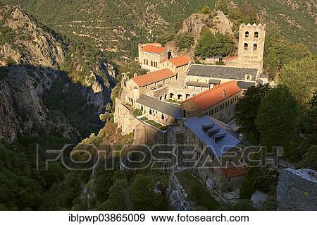 "First Romanesque or Lombard Romanesque style Abbey of Saint Martin-du-Canigou, Pyrenees-Orientales, France, Europe" View Large Photo Image Stock Photo - "First Romanesque or Lombard Romanesque style Abbey of Saint Martin-du-Canigou, Pyrenees-Orientales, France, Europe". Fotosearch