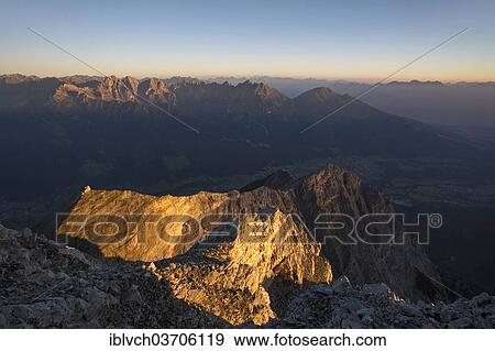"First sun rays on the peak of Serles Mountain, view towards the Kalkkoegel Mountains of Stubaital Valley, Stubai Valley, Stubai Alps, Tyrol, Austria, Europe" View Large Photo Image Stock Photo - "First sun rays on the peak of Serles Mountain, view towards the Kalkkoegel Mountains of Stubaital Valley, Stubai Valley, Stubai Alps, Tyrol, Austria, Europe". Fotosearch