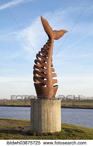 "Fish bone sculpture, Leybucht bay, Greetsiel, Krummhorn, East Frisia, Lower Saxony, Germany, Europe" View Large Photo Image Stock Photography - "Fish bone sculpture, Leybucht bay, Greetsiel, Krummhorn, East Frisia, Lower Saxony, Germany, Europe". Fotosearch