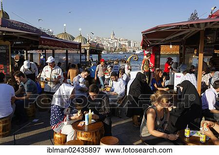 "Fish restaurants, Golden Horn, Eminoenue, Galata tower at the back, Istanbul, european side, Turkey, Europe, PublicGround, Asia" View Large Photo Image Stock Photo - "Fish restaurants, Golden Horn, Eminoenue, Galata tower at the back, Istanbul, european side, Turkey, Europe, PublicGround, Asia". Fotosearch