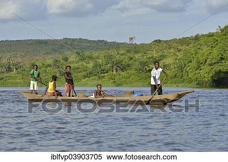 "Fisher family on a pirogue on the Congo River, near Tshumbiri, Bandundu Province, Democratic Republic of the Congo" View Large Photo Image Stock Photography - "Fisher family on a pirogue on the Congo River, near Tshumbiri, Bandundu Province, Democratic Republic of the Congo". Fotosearch